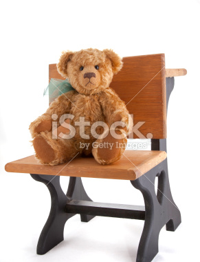 Teddy Bear Sitting at Desk